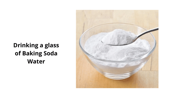 Drinking a glass of Baking Soda Water